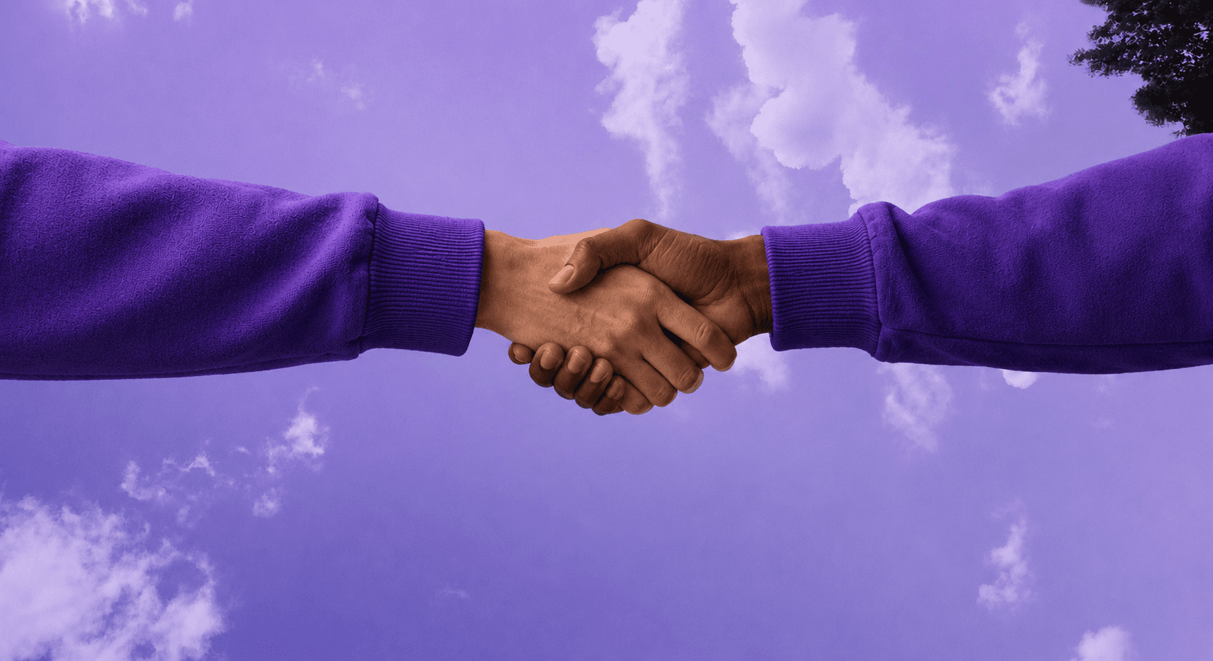 Two professionals shaking hands — Listi.ae, the UAE's referral network
